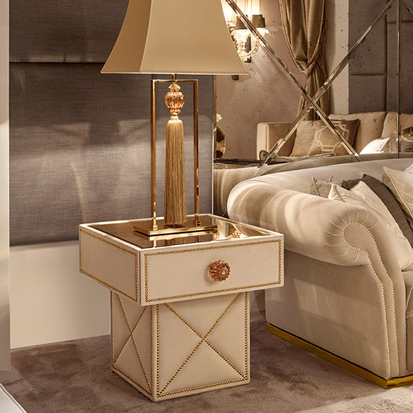 0539s<br>
mirrored-top occasional table, upholstered drawer with nailhead trim
60 x 60 x 62 cm<br>
 
G3043<br>
steel lamp, gold finish with amber crystal ball and tassel, complete with shade
30 x 15 x 104 cm<br>
 
CG8906 HERMES<br>
nailhead trim sofa with steel base, gold finish   
250 x 120 x 80 cm<br>
