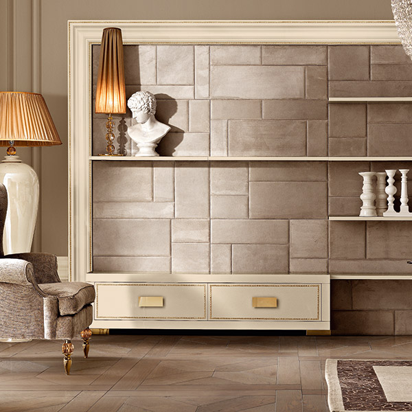 modular wall system with leather mosaic panel and wooden frame with nailhead trim<br>

TGPM02<br>
modular base, 2 upholstered drawers with nailhead trim, steel base with gold finish   
200 x 41 x 50 cm<br>
 
GL6901 Adelaide ELEGANCE<br>
luxury armchair with steel feet, gold finish with amber crystal ball  
136 x 90 x 135 cm<br>
 
G1065 BROADWAY<br>
mirror polished gold finish steel table, oval glass top   
240 x 140 x 73 cm <br>

G1045cp KARL<br>
buttoned swivel chair    
Ø 63  H. 73 cm<br>
 
GmR08<br>
mirror polished gold finish steel table, polished bevelled edge cappuccino marble top      
Ø 52 x 63 cm <br>

BS21 Cleo<br>
ceramic floor lamp with amber crystal ball and lampshade      
Ø 80 h. 200 cm<br>
 
cl4 <br>
18-light Empire style chandelier 
Ø 100 x 143 cm<br>

G1190<br>
steel lamp with amber crystal balls, gold finish, complete with shade  
Ø 25 x 106 cm