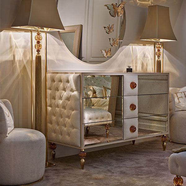 GL1310<br>
3-drawer dresser, buttoned sides, steel feet with gold finish and amber crystal ball, 
complete with amber knobs
160 x 69 x 102 cm<br>

4001<br>
round mirror with butterflies, gold   
Ø 120 cm<br>

G3042 <br>
floor lamp with steel frame, gold finish, amber crystal balls and tassel,complete with lampshade  
30 x 20 x 186 cm